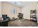A well-lit home office offers a great workspace, comfortable chair, and functional decor to maximize productivity at 7340 Zonal Ave, Las Vegas, NV 89131