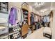 A well-organized walk-in closet features shelving, drawers, and hanging rods to accommodate all your storage needs at 7340 Zonal Ave, Las Vegas, NV 89131