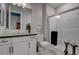 Elegant bathroom featuring a walk-in shower, decorative candles and black accents at 7416 Deschutes Cir, Las Vegas, NV 89129