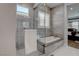 Luxurious bathroom featuring a glass shower and a separate soaking tub at 7416 Deschutes Cir, Las Vegas, NV 89129