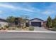 Beautiful single-story home with stone accents and well-maintained landscaping at 7416 Deschutes Cir, Las Vegas, NV 89129