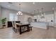Spacious kitchen and dining area with modern appliances, a chandelier, and plenty of space at 7416 Deschutes Cir, Las Vegas, NV 89129