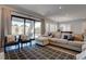 Bright living room features sliding glass doors and leads to the outdoor seating area at 7416 Deschutes Cir, Las Vegas, NV 89129