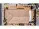 Aerial view of the roof, showing a light brown tile and well-maintained backyard at 7824 Warm Winds St, North Las Vegas, NV 89084