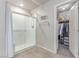 Bathroom featuring a glass shower with a bench and a closet at 7824 Warm Winds St, North Las Vegas, NV 89084