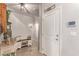 Inviting entryway with light walls, tile floors, and decorative touches at 7824 Warm Winds St, North Las Vegas, NV 89084