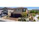Beautiful home with a two-car garage and a lush landscaped front yard. Paved driveway at 7824 Warm Winds St, North Las Vegas, NV 89084