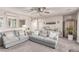 Inviting living room with soft carpeting, comfortable seating, and stylish decor at 7824 Warm Winds St, North Las Vegas, NV 89084
