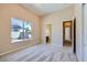 Bright bedroom showcasing carpet and a sunlit window at 8078 Leather Harness St, Las Vegas, NV 89131
