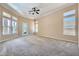 Bright, oversized bedroom with high ceilings, plenty of natural light, and an decorative glass door at 8078 Leather Harness St, Las Vegas, NV 89131