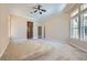 Spacious bedroom featuring high ceilings, neutral paint, and large windows for natural light at 8078 Leather Harness St, Las Vegas, NV 89131