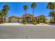 Beautiful single story home with stone accents, professional landscaping, and a three car garage at 8078 Leather Harness St, Las Vegas, NV 89131