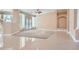 Inviting space boasts tile and carpet flooring, neutral walls, french doors and recessed lighting at 8078 Leather Harness St, Las Vegas, NV 89131
