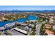Gorgeous aerial view of the community and lakeside shops, enhancing the area's appeal and convenience at 8100 Lake Hills Dr, Las Vegas, NV 89128