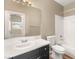 Bathroom featuring vanity with undermount sink and tiled shower/tub at 8100 Lake Hills Dr, Las Vegas, NV 89128