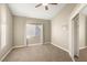 Neutral bedroom featuring plush carpet and ample natural light at 8100 Lake Hills Dr, Las Vegas, NV 89128