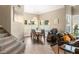 Bright dining area with ample windows and a pool view at 8100 Lake Hills Dr, Las Vegas, NV 89128