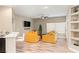 Spacious living room with a bar, perfect for entertaining guests at 8100 Lake Hills Dr, Las Vegas, NV 89128