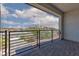 Outdoor balcony offers a charming view of the surrounding neighborhood and blue skies at 835 Jigglypuff Pl, Henderson, NV 89011