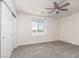 Bedroom featuring closet and exterior view from window at 835 Jigglypuff Pl, Henderson, NV 89011