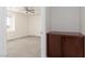 Bedroom view through doorway with carpet, ceiling fan, and exterior view at 835 Jigglypuff Pl, Henderson, NV 89011