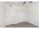 Neutral bedroom featuring carpet, a ceiling fan, and closet at 835 Jigglypuff Pl, Henderson, NV 89011