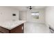 Open floorplan featuring new tile floors and natural light at 835 Jigglypuff Pl, Henderson, NV 89011