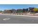 Playground under construction with modern equipment and safety fencing at 835 Jigglypuff Pl, Henderson, NV 89011
