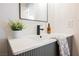 Stylish bathroom features a modern vanity, sleek black faucet, and elegant decor at 8401 Airmont Ct, Las Vegas, NV 89128