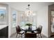 Cozy dining area with natural light and backyard views at 8401 Airmont Ct, Las Vegas, NV 89128