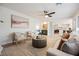 Bright living room featuring hardwood floors, neutral paint colors, and modern furniture perfect for entertaining at 8401 Airmont Ct, Las Vegas, NV 89128