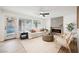 Bright and airy living room features modern fireplace and stylish furnishings at 8401 Airmont Ct, Las Vegas, NV 89128
