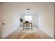 Bright home office with light wood floors and white walls at 8401 Airmont Ct, Las Vegas, NV 89128