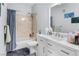 This bathroom features a vanity with storage and a shower at 8501 W University Ave # 1002, Las Vegas, NV 89147