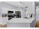 Bright kitchen featuring quartz countertops, stainless steel appliances, and modern finishes at 8501 W University Ave # 1002, Las Vegas, NV 89147