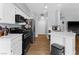 Well-equipped kitchen featuring stainless steel appliances, white cabinetry, and ample counter space at 8501 W University Ave # 1002, Las Vegas, NV 89147