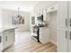 Bright kitchen showcases stainless steel appliances and stylish lighting at 8501 W University Ave # 1042, Las Vegas, NV 89147