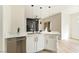 Open kitchen with marble countertops, stainless steel appliances, and a modern sink at 8501 W University Ave # 1042, Las Vegas, NV 89147