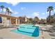 Community pool and lounge area with ample seating for residents at 8501 W University Ave # 1042, Las Vegas, NV 89147