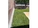 Lush backyard featuring a concrete patio and well-maintained green grass at 9360 Canalino Dr, Las Vegas, NV 89134