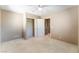 A basic bedroom features a closet and a connecting door to another room at 9360 Canalino Dr, Las Vegas, NV 89134
