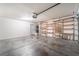 Spacious garage featuring built-in shelving for ample storage and organization at 9360 Canalino Dr, Las Vegas, NV 89134