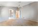 Spacious main bedroom features neutral paint, carpet, and an ensuite bathroom at 9360 Canalino Dr, Las Vegas, NV 89134