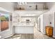 Bright kitchen with white cabinets, stainless steel appliances, and an eat-in peninsula at 9445 January Dr, Las Vegas, NV 89134