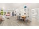 Spacious living room featuring a dining area with large windows and plenty of sunlight at 9445 January Dr, Las Vegas, NV 89134