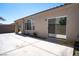 Backyard featuring a concrete patio, with space for outdoor activities and relaxation at 9710 Geiger Peak Ct, Las Vegas, NV 89148