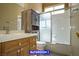 Well-maintained bathroom with a tub-shower combination and cabinet at 9710 Geiger Peak Ct, Las Vegas, NV 89148