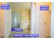 Primary bath with dual closets, standalone shower, and tub at 9710 Geiger Peak Ct, Las Vegas, NV 89148