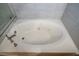 Close-up of bathtub featuring jets at 9710 Geiger Peak Ct, Las Vegas, NV 89148