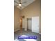 Bedroom with wood-look floors, neutral paint, closet, and neutral doors at 9710 Geiger Peak Ct, Las Vegas, NV 89148